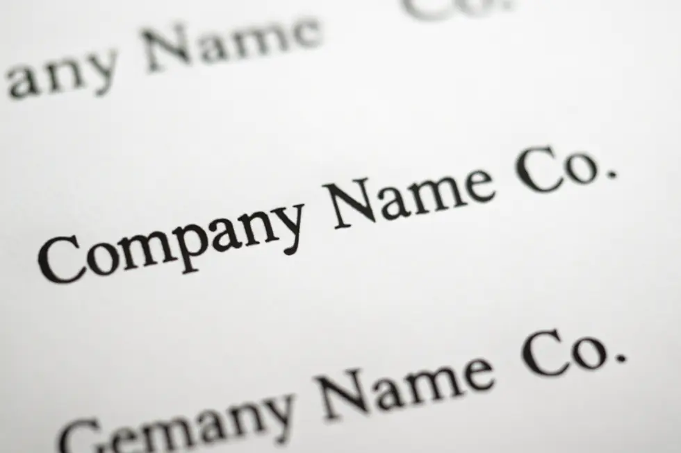 Business owners collaborating creatively on company name ideas and brand concepts.